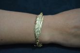 Pulseira pena dourada - P1322