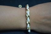 Pulseira transpassada dourada - P1203