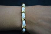 Pulseira transpassada dourada - P1203