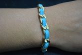 Pulseira transpassada dourada - P1203