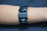 Bracelete preto com dourado - P1252