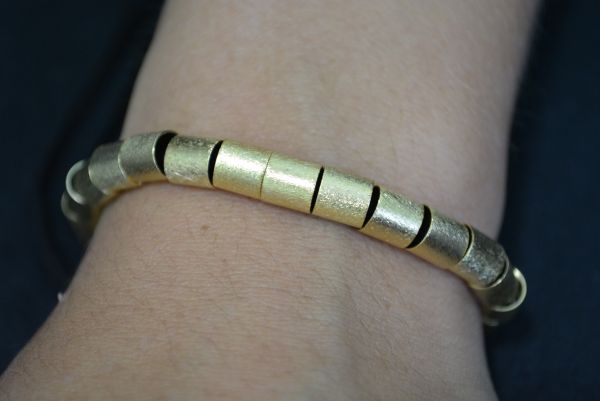 Pulseira argolas douradas - P1333