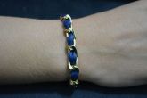 Pulseira transpassada dourada - P1203