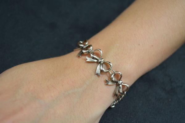 Pulseira lacinhos - P1613