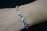 Pulseira 4 florzinhas - P1302