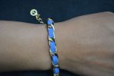 Pulseira transpassada dourada - P1203